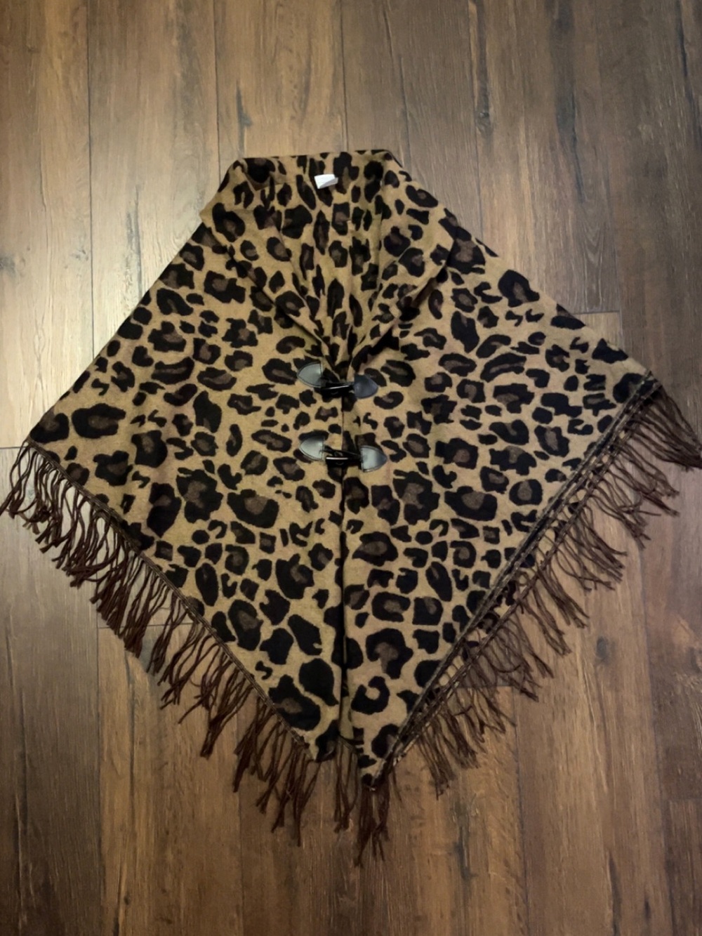 Boutique Leopard Print Fringe Poncho